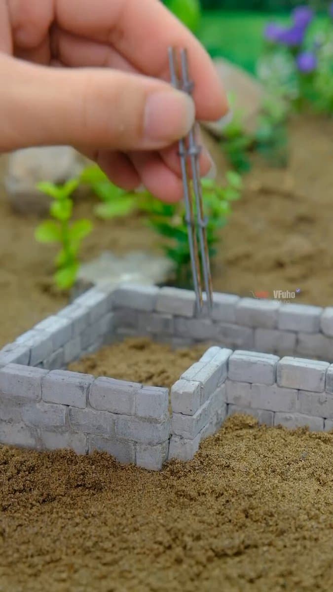 Create an ultra-realistic cinematic miniature construction video showing a tiny 
