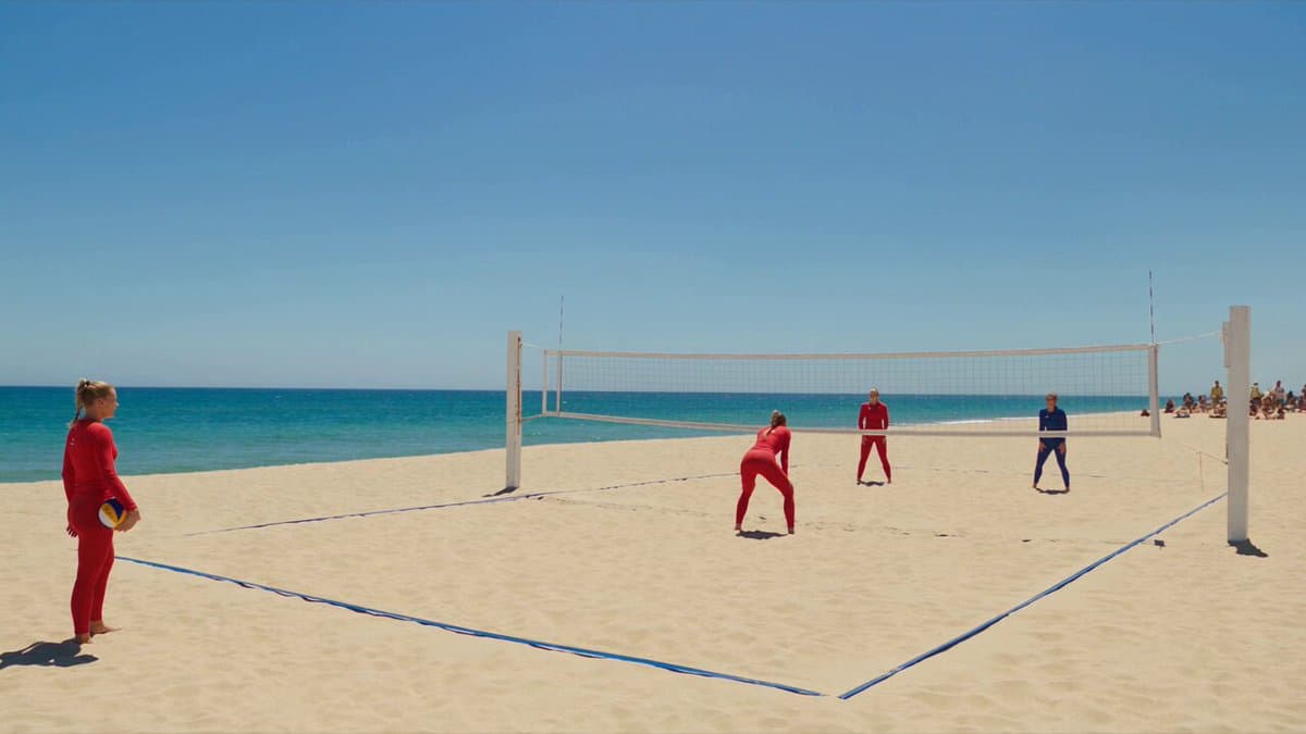 Ultra-photorealistic professional beach-volleyball footage on a sunny summer aft